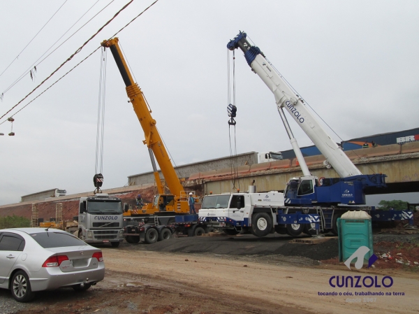 A Cunzolo realizou o i�amento de 02 vigas de 30 metros de comprimento, 1,20 metros de largura e peso de 30 toneladas cada. Para essa opera��o foram utilizados 01 Guindaste Rodovi�rio Tadano ATF 220 (cap. 220 t.), 01 Guindaste Rodovi�rio Liebherr 220 (cap. 220 t.) e 02 carretas Dolly.