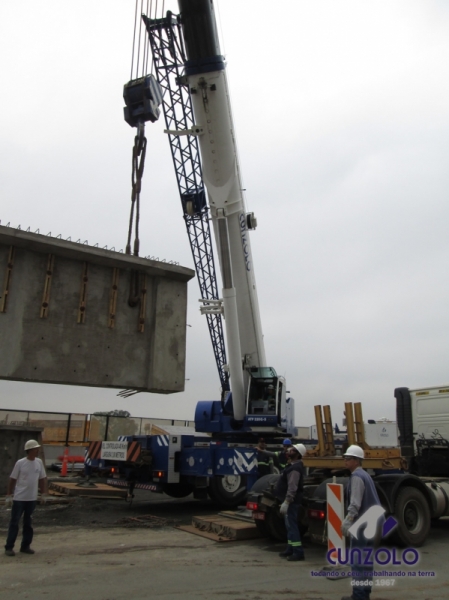 A Cunzolo realizou o i�amento de 02 vigas de 30 metros de comprimento, 1,20 metros de largura e peso de 30 toneladas cada. Para essa opera��o foram utilizados 01 Guindaste Rodovi�rio Tadano ATF 220 (cap. 220 t.), 01 Guindaste Rodovi�rio Liebherr 220 (cap. 220 t.) e 02 carretas Dolly.